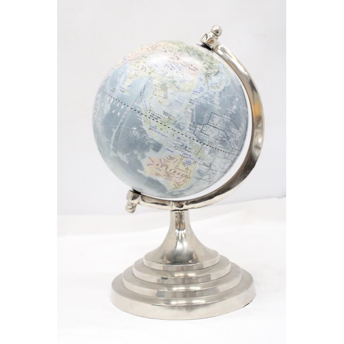 213 - A GLOBE ON A CIRCULAR PEDESTAL BASE, HEIGHT 34CM