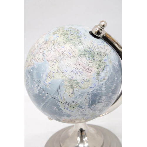 213 - A GLOBE ON A CIRCULAR PEDESTAL BASE, HEIGHT 34CM