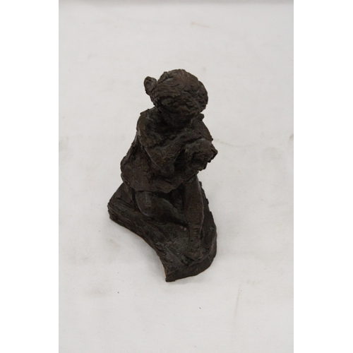 238 - A VINTAGE RESIN SCULPTURE OF A GIRL WITH DOG - APPROXIMATELY 18CM HIGH