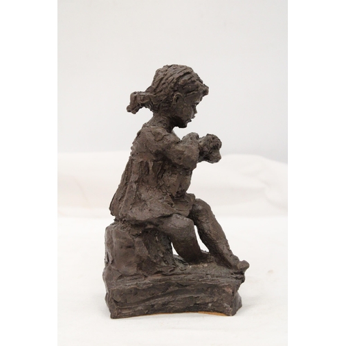 238 - A VINTAGE RESIN SCULPTURE OF A GIRL WITH DOG - APPROXIMATELY 18CM HIGH