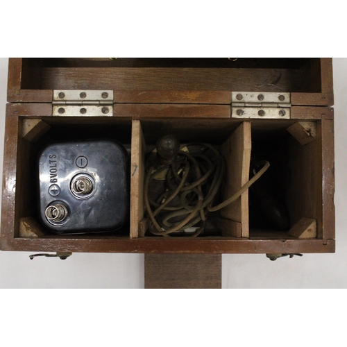 271 - A VINTAGE ELECTRONIC MEDICAL APPLIANCE - IN OAK CASE