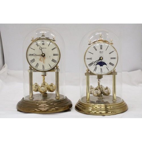 280 - TWO BRASS ANNIVERSARY CLOCKS WITH GLASS DOMES