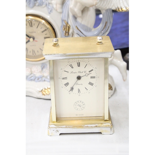 282 - TWO MANTLE CLOCKS TO INCLUDE A CERAMIC ANGEL WITH CHILDREN, PLUS A CARRIAGE CLOCK