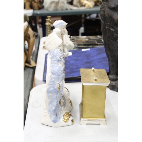 282 - TWO MANTLE CLOCKS TO INCLUDE A CERAMIC ANGEL WITH CHILDREN, PLUS A CARRIAGE CLOCK