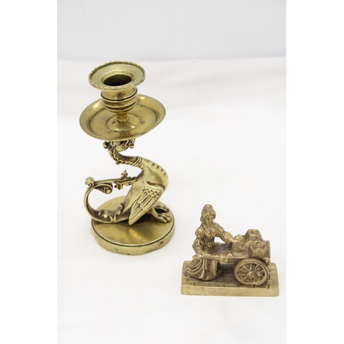 289 - A VINTAGE BRASS GRYPHON CANDLESTICK PLUS A MOLLY MALONE FIGURE