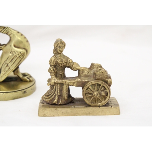 289 - A VINTAGE BRASS GRYPHON CANDLESTICK PLUS A MOLLY MALONE FIGURE