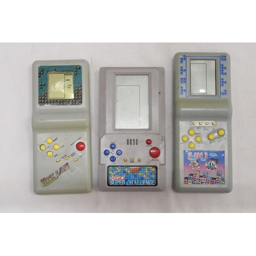 311A - THREE VINTAGE HAND HELD GAMES TO INCLUDE, 'BLOCK GAME', 'SUPER CHALLENGE' AND '5 IN 1'