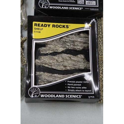 588 - TWO BOXED WOODLAND SCENICS READY ROCKS SHELF AND A QUANITY OF STONE WALLING