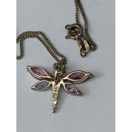 704 - A MARKED 925 SILVER NECKLACE WITH A SILVER AND COLOURED STONE DRAGONFLY PENDANT