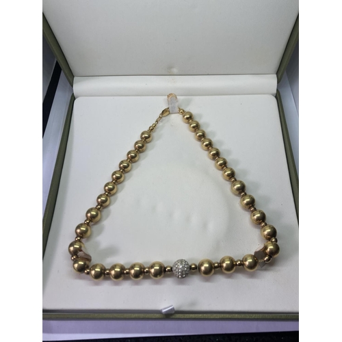 741 - A 1980'S SILVER GILT SPHERE NECKLACE WITH DIAMANTE BALL IN A PRESENTATION BOX