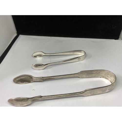 743 - FOUE SILVER PLATED ITEMS TO INCLUDE THREE SETS OF NIPS AND A BUTTER KNIFE