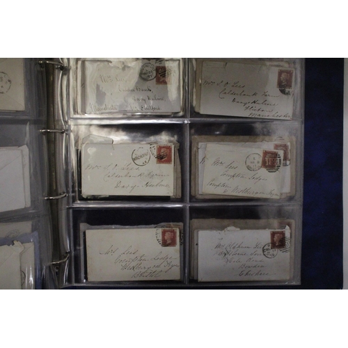 912 - A SELECTION OF VICTORIAN ENVELOPES IN A BLUE BINDER WITH FIFTY PENNY RED STAMPS