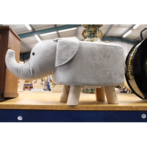 969 - AN ELEPHANT FOOTSTOOL - AS NEW, HEIGHT 28CM, LENGTH APPROX 52CM