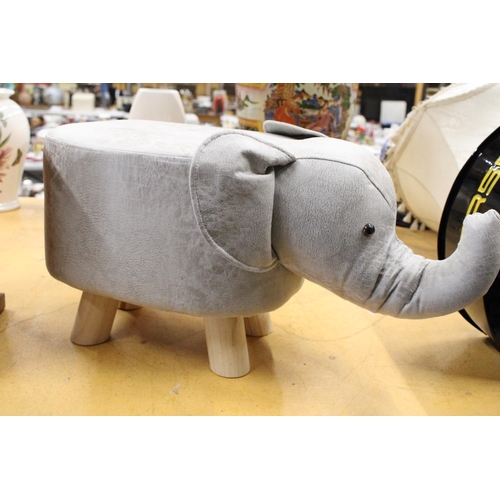 969 - AN ELEPHANT FOOTSTOOL - AS NEW, HEIGHT 28CM, LENGTH APPROX 52CM