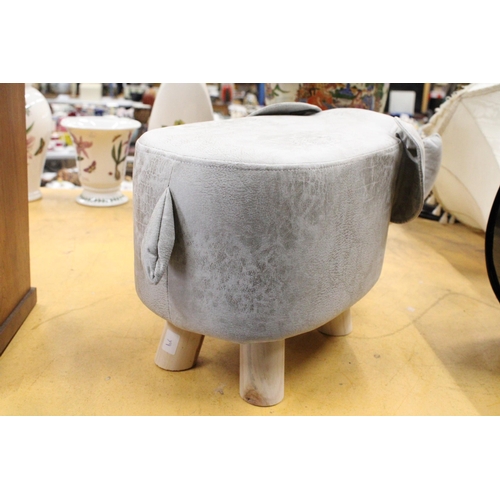 969 - AN ELEPHANT FOOTSTOOL - AS NEW, HEIGHT 28CM, LENGTH APPROX 52CM