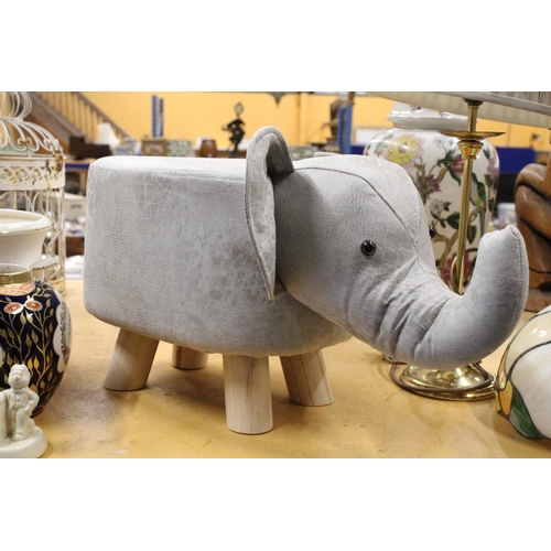 969 - AN ELEPHANT FOOTSTOOL - AS NEW, HEIGHT 28CM, LENGTH APPROX 52CM