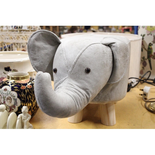 969 - AN ELEPHANT FOOTSTOOL - AS NEW, HEIGHT 28CM, LENGTH APPROX 52CM