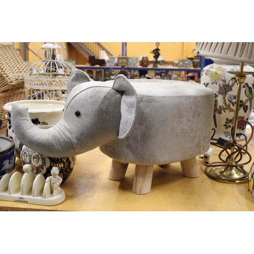 969 - AN ELEPHANT FOOTSTOOL - AS NEW, HEIGHT 28CM, LENGTH APPROX 52CM