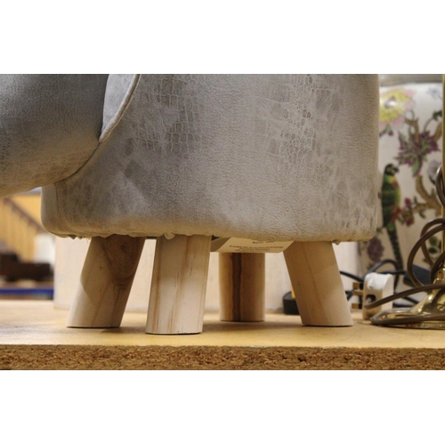 969 - AN ELEPHANT FOOTSTOOL - AS NEW, HEIGHT 28CM, LENGTH APPROX 52CM