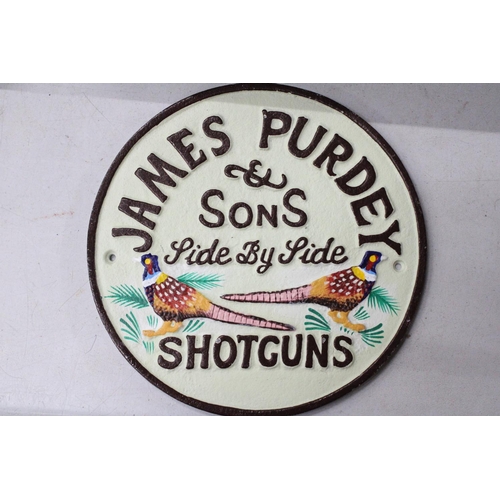 981 - A CAST 'JAMES PURDEY SHOTGUNS' SIGN, DIAMETER, 22CM