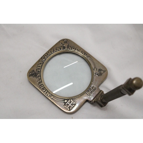 1001 - A BRASS MICHELIN MAGNIFYING GLASS IN A LEATHER CASE