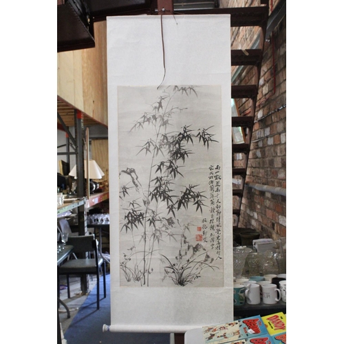 1034 - AN ORIENTAL SCROLL WITH BAMBOO DESIGN AND CHARACTER MARKS, ON PAPER BACKED MATERIAL, 60CM X 155CM