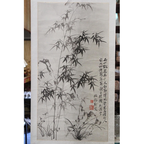 1034 - AN ORIENTAL SCROLL WITH BAMBOO DESIGN AND CHARACTER MARKS, ON PAPER BACKED MATERIAL, 60CM X 155CM