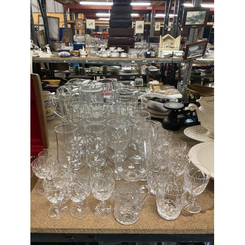 1057 - A QUANTITY OF GLASSES TO INCLUDE WINE, SHERRY, TUMBLERS, ETC