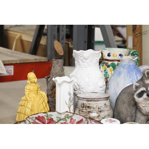 1161 - A QUANTITY OF CERAMICS AND CHINA TO INCLUDE, VASES, JUGS, PLATES, RACCOON FIGURE, PILL BOXES, ETC