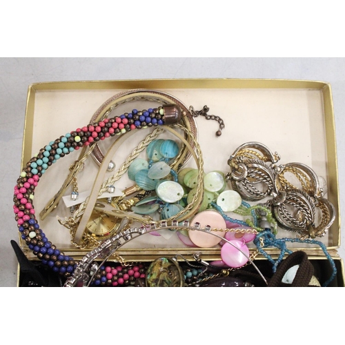 1184 - A QUANTITY OF COSTUME JEWELLERY TO INCLUDE NECKLACES, EARRINGS, BANGLES, ETC, IN A DOMED BOX