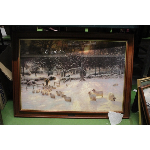 1201 - A LARGE FRAMED JOSEPH FARQUHARSON PRINT OF SHEEP IN A SNOWY FIELD, 86CM X 62CM