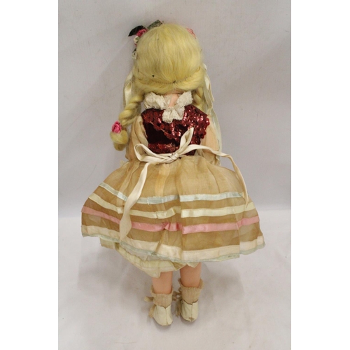 1236 - A VINTAGE DOLL WITH ORIGINAL COSTUME AND SLEEPY EYES