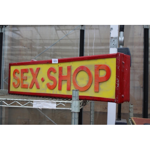 1572 - AN ILLUMINATED SEX SHOP SIGN