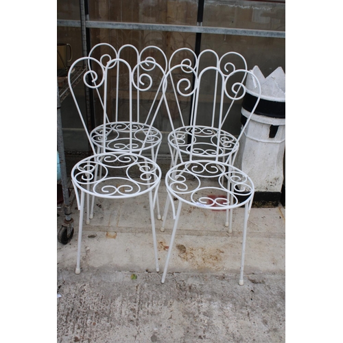 1612 - A SET OF FOUR ORNATE AND DECORATIVE METAL BISTRO CHAIRS