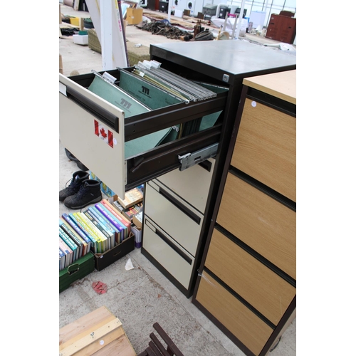 1874 - A METAL FOUR DRAWER FILING CABINET AND A FURTHER WOODEN FOUR DRAWER FILING CABINET