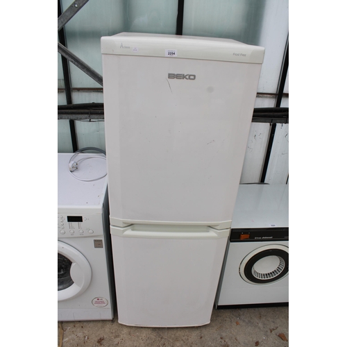 2254 - A WHITE BEKO UPRIGHT FRIDGE FREEZER