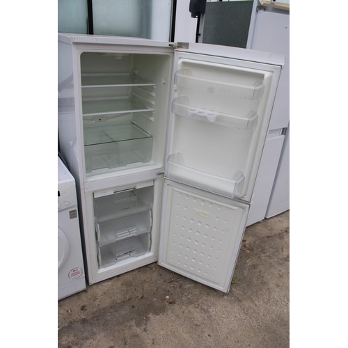 2254 - A WHITE BEKO UPRIGHT FRIDGE FREEZER