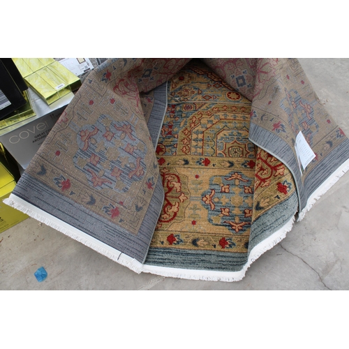 2483 - A BELIEVED AS NEW MADE IN TURKEY YELLOW AND BLUE PATTERNED RUG (305CM x 345CM)