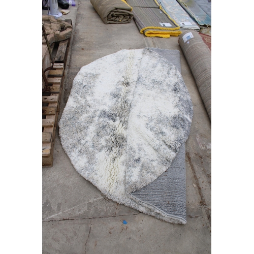 2493 - A BELIEVED AS NEW MADE IN TURKEY ROUND PEBBLE GREY RUG (245CM)