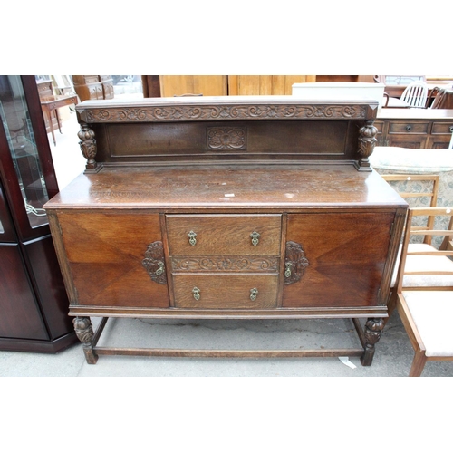 2667 - AN EARLY 20TH CENTURY OAK JACOBEAN STYLE SIDEBOARD, 60