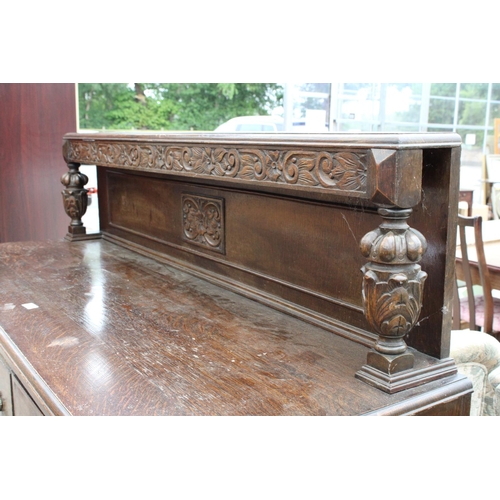 2667 - AN EARLY 20TH CENTURY OAK JACOBEAN STYLE SIDEBOARD, 60