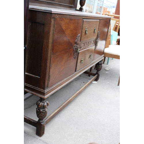 2667 - AN EARLY 20TH CENTURY OAK JACOBEAN STYLE SIDEBOARD, 60