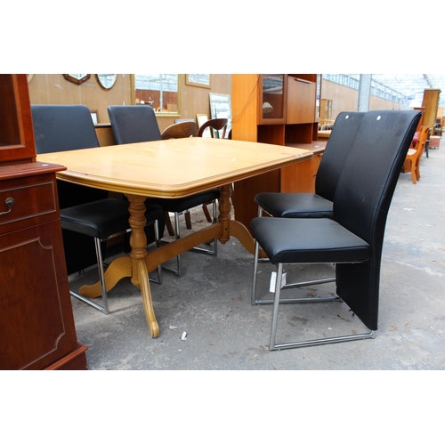 2960 - A MODERN HARDWOOD EXTENDING DINING TABLE AND FOUR BLACK FAUX LEATHER CHAIRS