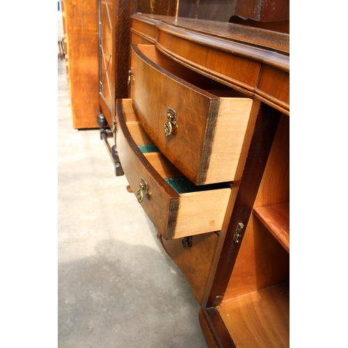 2989 - A MID 20TH CENTURY WALNUT DINING SUITE COMPRISING DRAW LEAF TABLE, FOUR CHAIRS AND SIDEBOARD