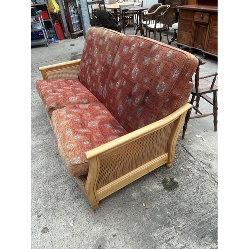 3047 - AN ERCOL ELM BERGERE SETTEE