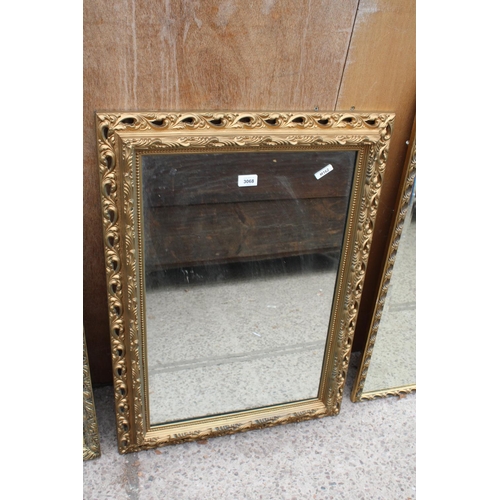 3068 - A MODERN GILT FRAMED WALL MIRROR, 33