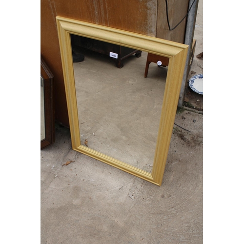 3082 - A MODERN WALL MIRROR, 34