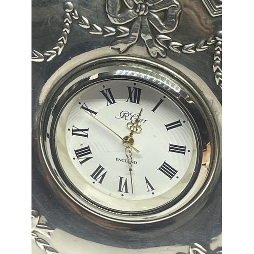 2 - A HALLMARKED SHEFFIELD SILVER R CARR ENGLAND MANTLE CLOCK WITH DECORATIVE RIBBON DESIGN HEIGHT 9CM