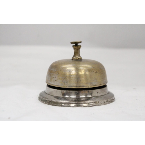 105 - A METAL TABLE TOP SHOP BELL