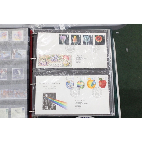 143 - TWO ALBUMS OF STAMPS, ONE CONTAINING FIRST DAY COVERS, THE OTHER, BRITISH STAMPS